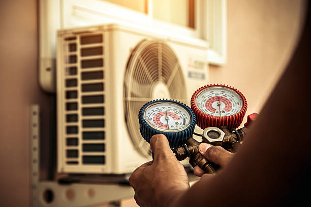 Professional Air Conditioning Service technician working in Bacliff, TX